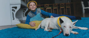 Living Magazines Dog and autistic child