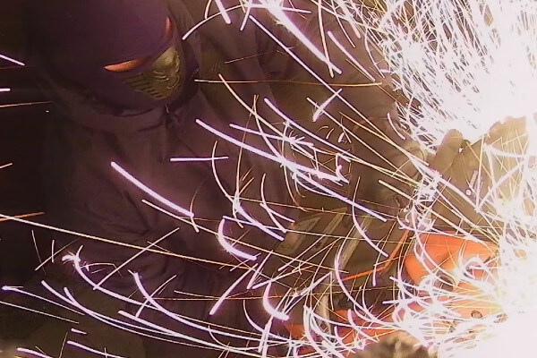 Living Magazines Burglar using angle grinder to get into a shop in Herts