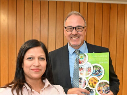Cllr Adrian England, Leader of Dacorum Borough Council with Cllr Simi Dhyani, Deputy Leader and Portfolio Holder for Housing and Property Services, holding the new corporate plan.