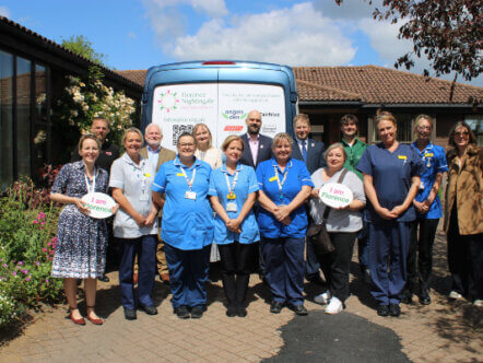 Donors and staff outside the Hospice