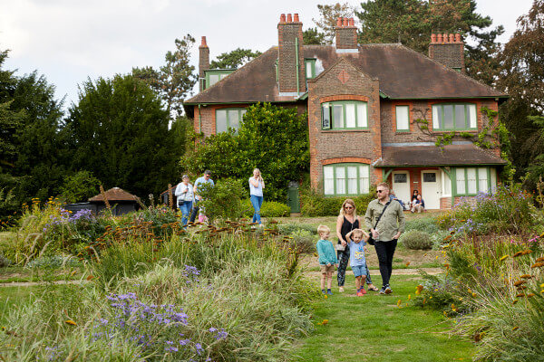 Families enjoy the summer garden at Shaw's Corner in Hertfordshire (c) National Trust Images Arnhel de Serra