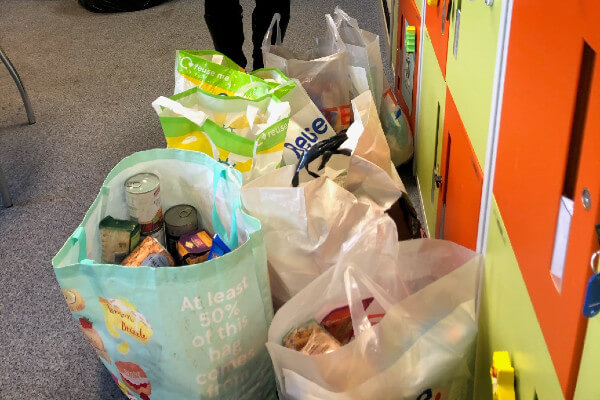 Living Magazines Food bank donation from Domestic Abuse Unit