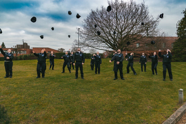 Living Magazines Fri5Mar police officers pass out