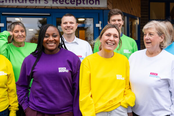 Keech Hospice Members of the team proudly sporting the new brand colours Credit Simon Turner