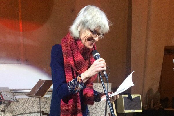 Living Magazines Leslie Tate reading at a Milton Keynes Foodbank Event, photo by Ashra Burnham