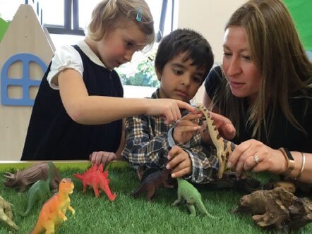Lockers Park School Pupils Playing with Dinosaurs
