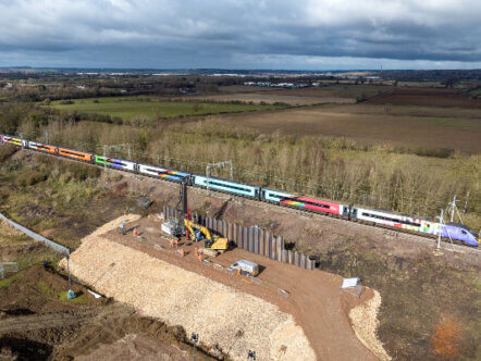 Living Magazines Network Rail Blisworth earthworks drone shot with Avanti Progress Train passing by