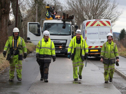 Living Magazines Openreach engineer repairing storm damage