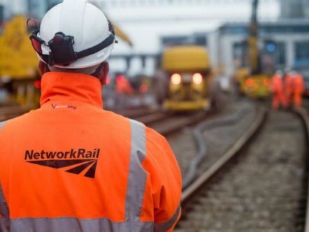 Living Magazines Rail worker on track, Cardiff. August bank holiday rail closures