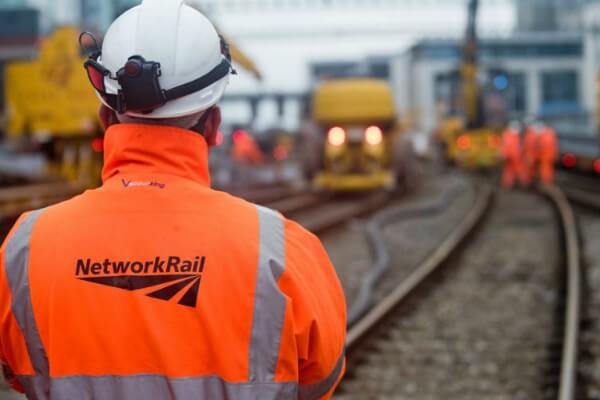 Living Magazines Rail worker on track, Cardiff. August bank holiday rail closures