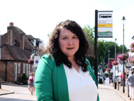 Victoria Collins MP at a bus stop in Berkhamsted High Street