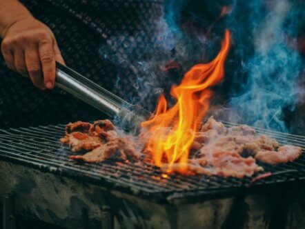 Living Magazines BBQ safety close-up-photo-of-man-cooking-meat-1482803