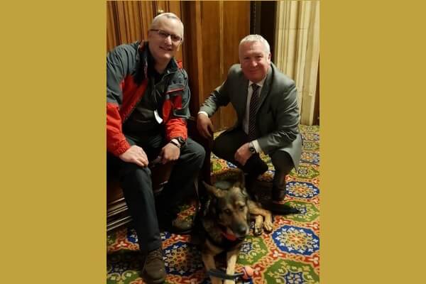 Living Magazines Sir Mike Penning MP with Finn and PC Wardle