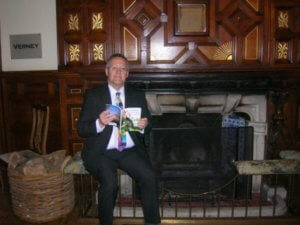 Living Magazines Bob Little in the panelled hall at Pendley Manor